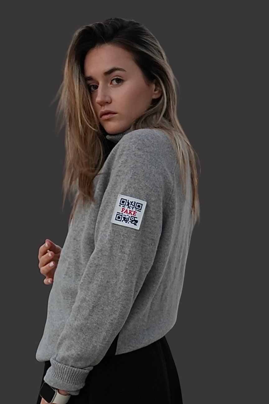 Zipper
Statement | Grau